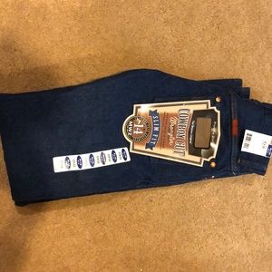 Brand new  0 by 32” high waisted wrangler jeans